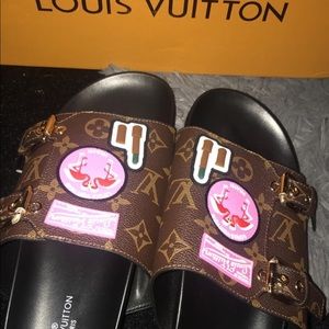 Louis V Slides